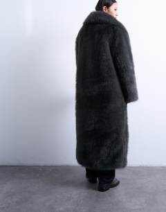 Model wearing Faux fur oversized shawl extra long coat in charcoal