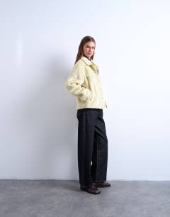 Model wearing Faux fur pony skin western trucker jacket in buttermilk