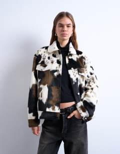 Faux fur pony skin western trucker jacket in cow print