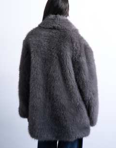 Model wearing Faux fur shawl mid length coat in charcoal