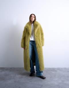 Model wearing Faux fur super long coat in green