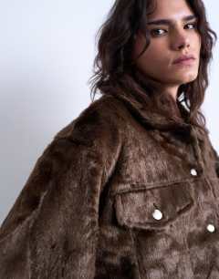 Model wearing Faux fur western trucker jacket in brown