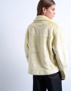 Model wearing Faux fur western trucker jacket in buttermilk