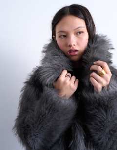 Model wearing Faux fur zip thru bomber jacket in grey