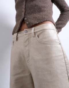 Model wearing Faux leather A line trouser in ecru