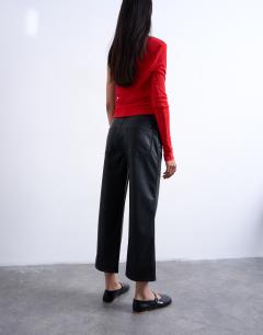 Model wearing Faux leather ankle grazer trouser in black