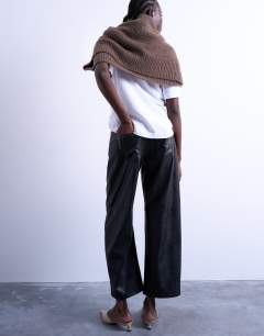 Model wearing Faux leather barrel leg trouser in black