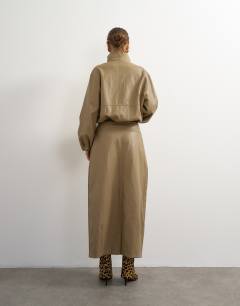 Model wearing Faux leather barrel midi skirt in taupe