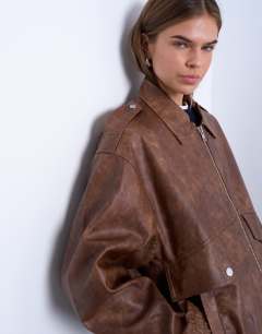 Model wearing Faux leather bomber jacket in washed brown