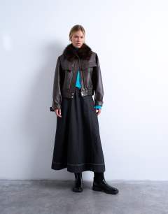 Model wearing Faux leather boxy zip through pocket bomber jacket with detachable fur collar in washed brown