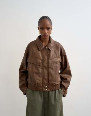 Topshop faux leather boxy zip up pocketed bomber jacket in washed