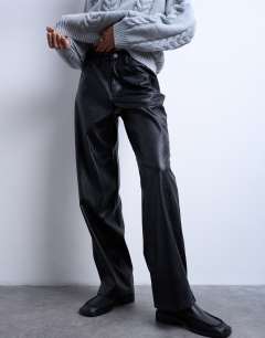 Model wearing Faux leather cinch trouser in black