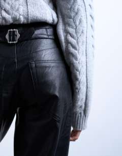 Model wearing Faux leather cinch trouser in black