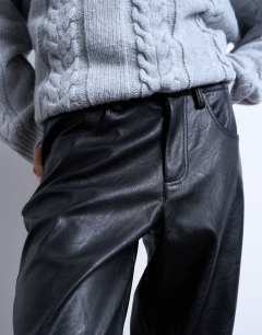 Model wearing Faux leather cinch trouser in black