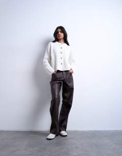 Model wearing Faux leather cinch trouser in brown