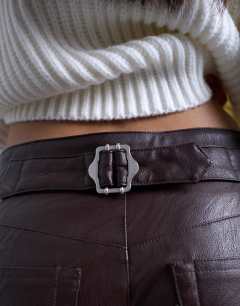 Model wearing Faux leather cinch trouser in brown