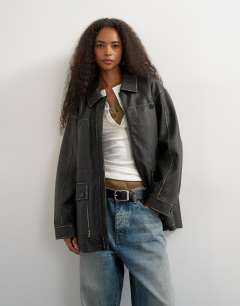 Model wearing Faux leather cinch waist jacket in black