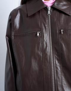 Model wearing Faux leather clean zip through jacket in deep burgundy