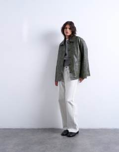 Model wearing Faux leather collar button thru padded shacket in green