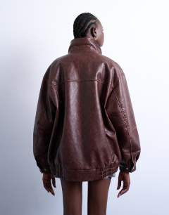 Model wearing Faux leather contrast heavy wash bomber jacket in brown