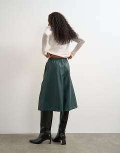 Model wearing Faux leather culotte in green