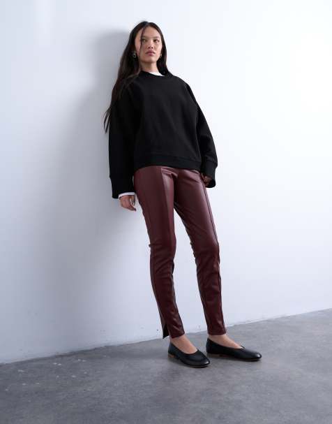 Topshop faux leather drainpipe skinny pants in burgundy - view 1