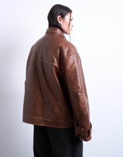 Model wearing Faux leather funnel neck biker jacket in washed brown