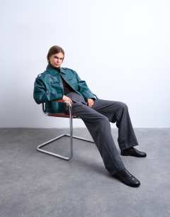 Model wearing Faux leather heavy washed zip through jacket in teal