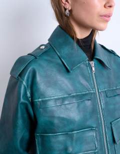 Model wearing Faux leather heavy washed zip through jacket in teal