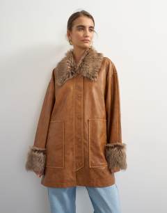 Faux leather jacket with faux fur trim in tan