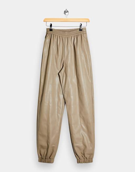 Topshop faux leather joggers in beige ASOS