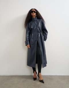 Model wearing Faux leather longline cinch waist trench coat in navy