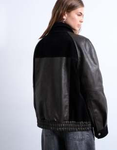 Model wearing Faux leather patch pocket jacket with faux suede contrast in brown