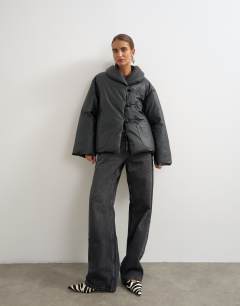 Model wearing Faux leather pillow scarf puffer jacket in black