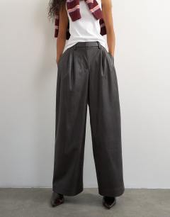 Model wearing Faux leather pleated in espresso