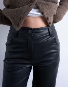 Model wearing Faux leather seam detail straight leg trouser in black