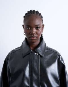 Model wearing Faux leather shiny mottled patch pocket shacket in black