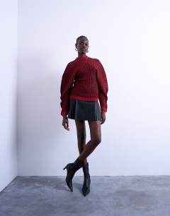 Model wearing Faux leather tailored mini skirt in black