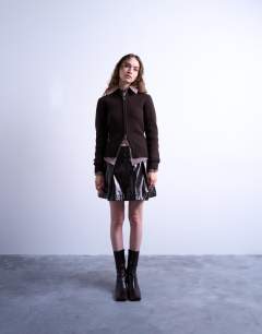 Model wearing Faux leather tailored mini skirt in coffee
