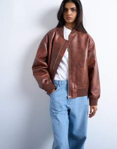 Model wearing Faux leather vintage wash oversized collarless bomber jacket in tan