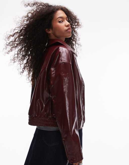 Topshop faux leather vinyl bomber jacket in burgundy | ASOS