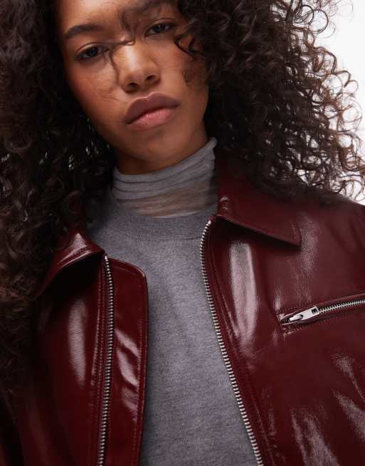 Topshop faux leather vinyl bomber jacket in burgundy | ASOS