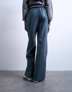 Model wearing Faux leather wide leg jogger with pinseam detail in blue