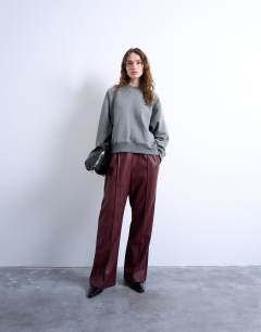 Faux leather wide leg jogger with pinseam detail in burgundy