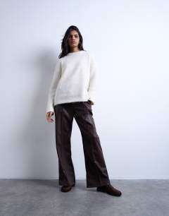 Model wearing Faux leather wide leg jogger with pinseam detail in chocolate