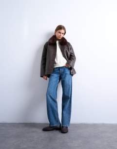 Model wearing Faux leather with detachable faux fur collar button thru padded shacket in washed brown