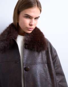 Model wearing Faux leather with detachable faux fur collar button thru padded shacket in washed brown