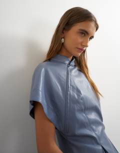 Model wearing Faux leather zip detail batwing top in soft blue