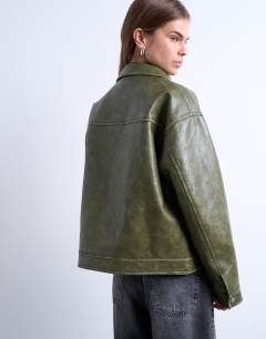 Model wearing Faux leather zip through jacket with patch pockets in washed green