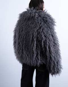 Model wearing Faux mongolian fur bomber coat in grey